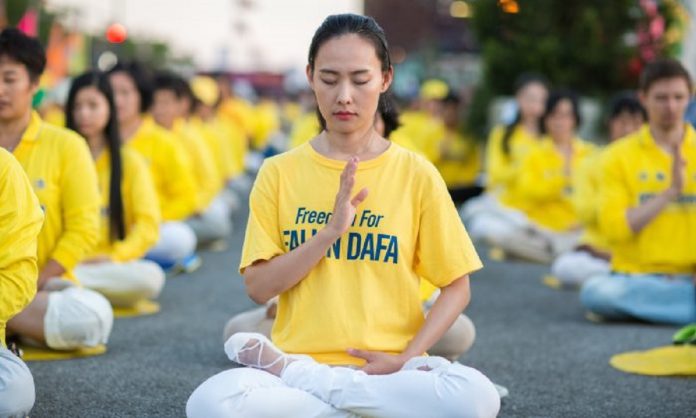 praktisi Falun Dafa dianiaya oleh rezim Tiongkok
