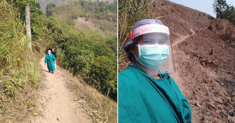 Dokter Mengenakan APD dalam Cuaca Terik Mendaki Gunung untuk Mengobati Anak Sakit yang Dikarantina di Pegunungan